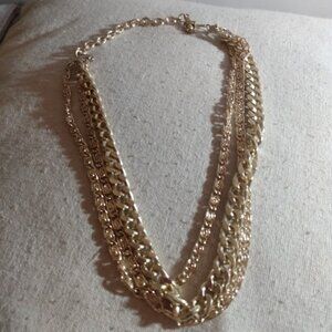 Coro: Vintage gold tone multi chain necklace.